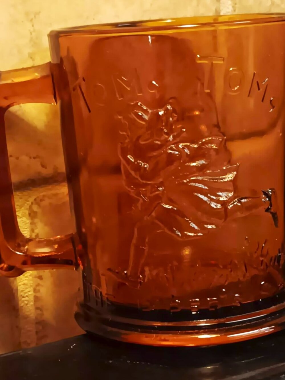 Indiana glass Tiara Amber child's mug, Humpty Dumpty and Tom Tom the piper's son